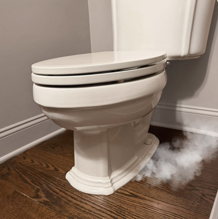 Smoke test with a Blowfish Smoke Blower revealing a bad toilet seal